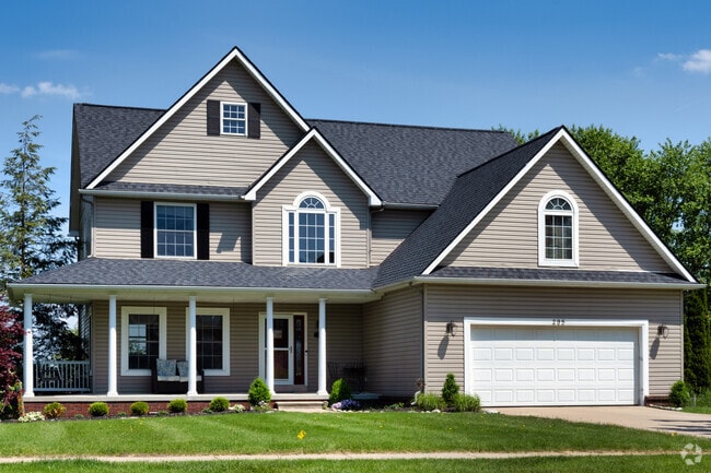 This multi-gabled home in South Side is one of a collection of newer builds.