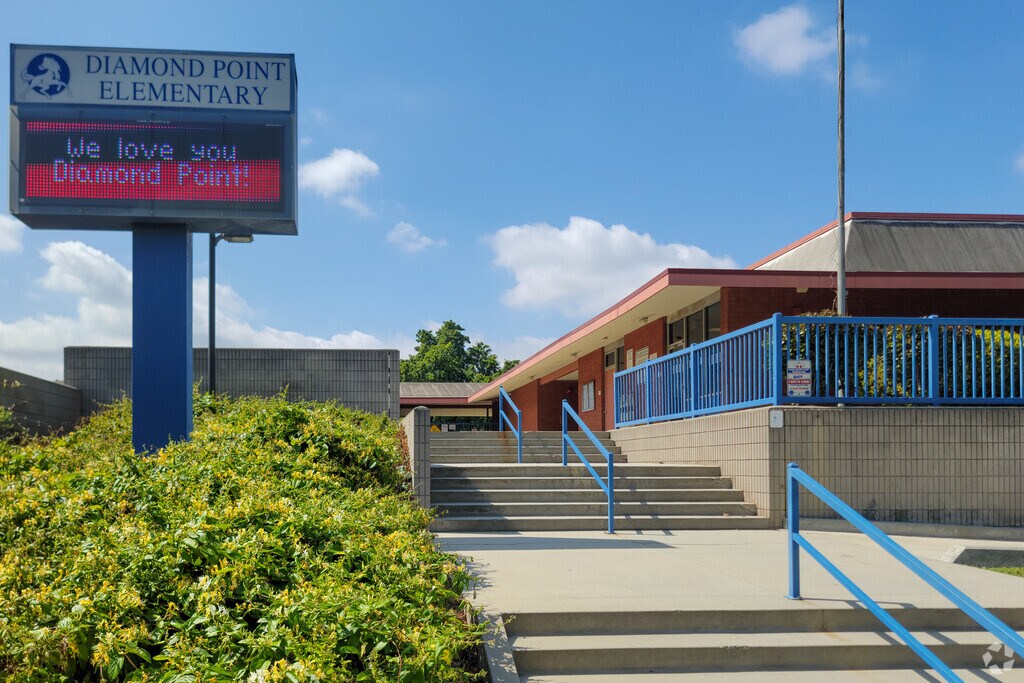 Stairs lead to the entrance of Diamond Point Elementary School.