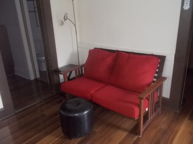 Living room couch on west wall