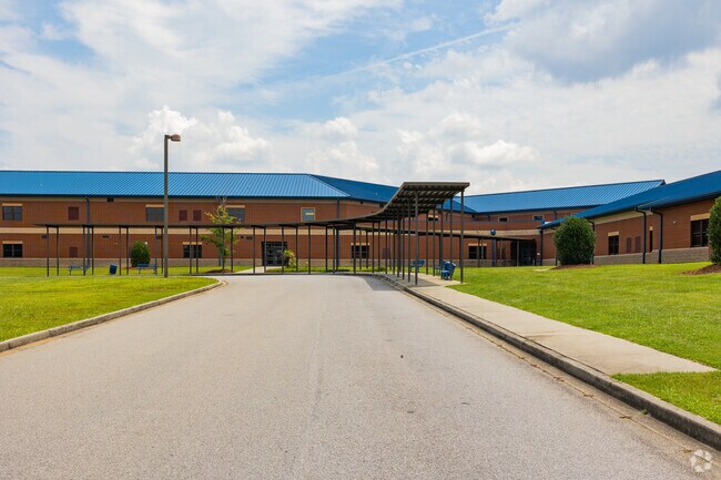W.J. Keenan High School in Columbia has a covered drop off area for students.
