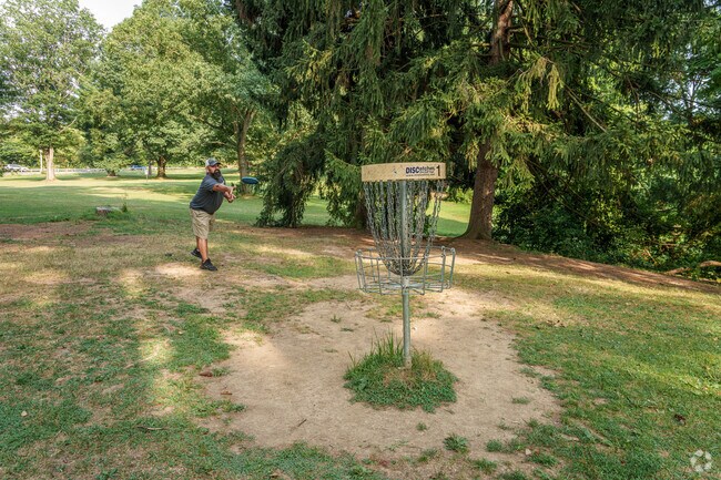As the sun sets, these disc golfers come out to Buchmiller Park to score a hole-in-one.
