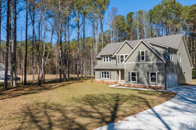 Natural tree linings provide privacy between Abilene homes.