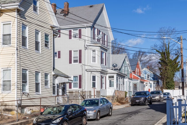 Traditional triple-deckers are interspersed with single-family homes in Bank Street.