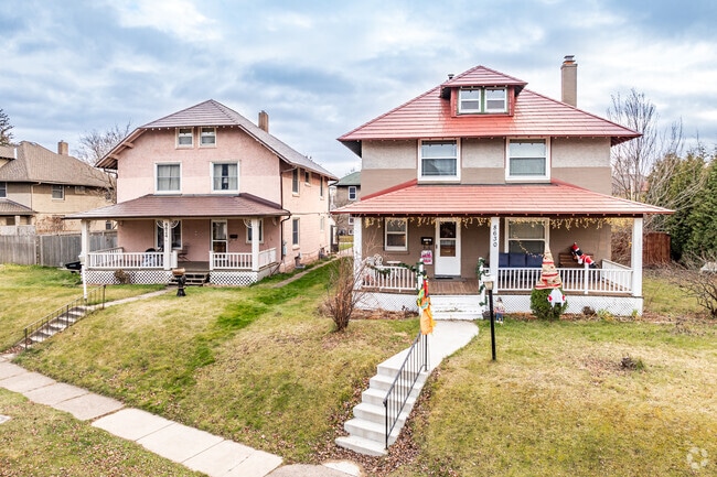 Larger homes in Morgan Park offer shaded front porches.