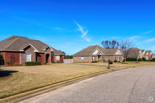 Pristine landscaping graces the beautiful row of homes in Wetumpka.