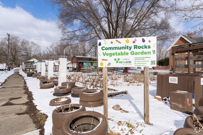 Residents of The Avenues tend to their community vegetable garden in the spring and summer.