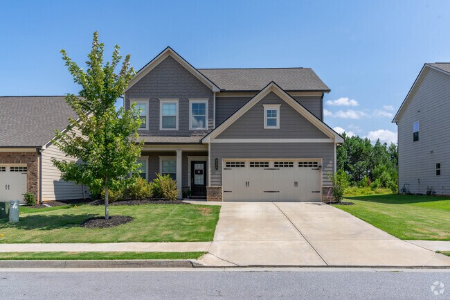 Manicured lawns and tidy porches are common place in Mundy Mill.