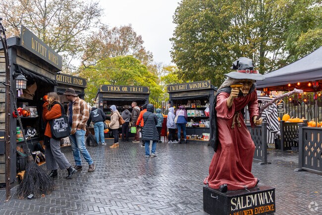 Visitors browse Halloween-themed market stalls in Salem, Massachusetts, where witchy wares, spooky decor, and festive fun capture the season's spirit in the Witch City.
