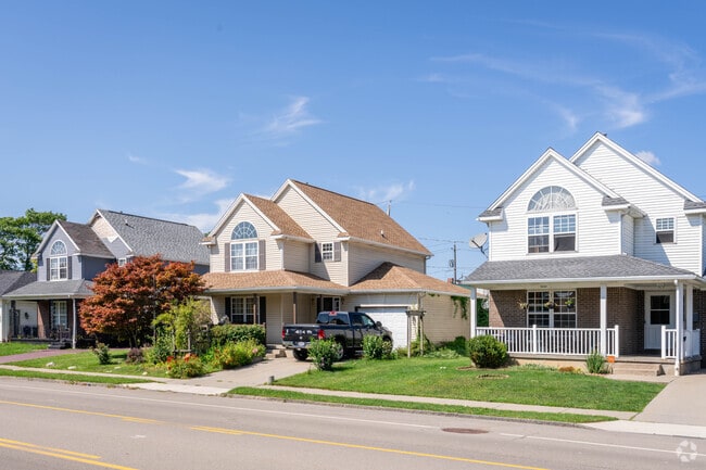 Homes in Ellicott often include driveways and garages.