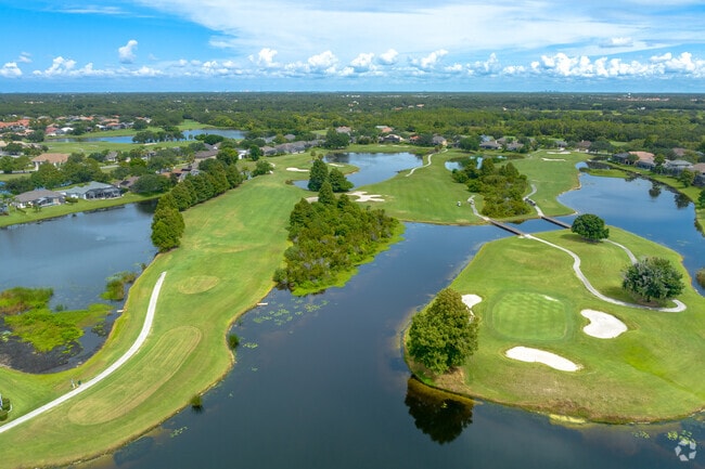 Kissimmee Bay is a traditional 6,830-yard, par-71, southern-style championship golf course.