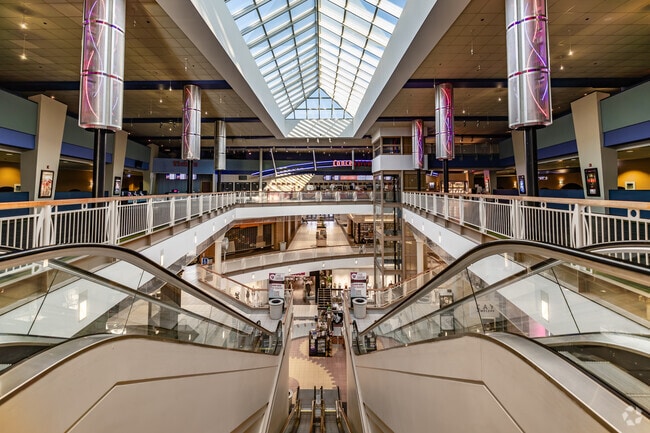 Brass Mill Center near East End District offers department stores and clothing shops.