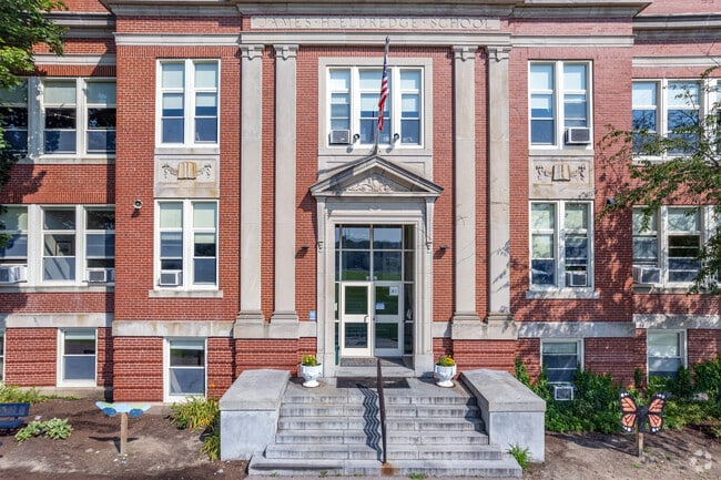 The main entry to James H. Eldridge Elementary School in East Greenwich is a classical portal.