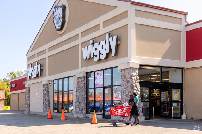 The closest grocery store to Humble Park is Piggly Wiggly.