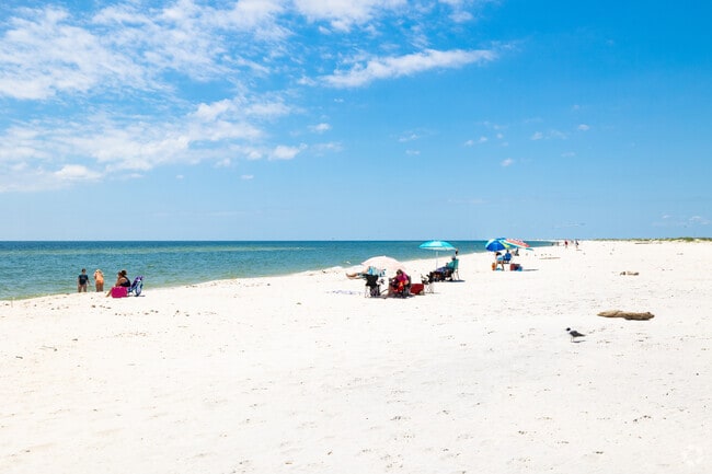 Dauphin Island beaches call to neighboring Grand Bay locals.