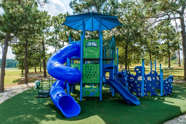 Gracewood Park boasts blue slides shaded by mature trees.