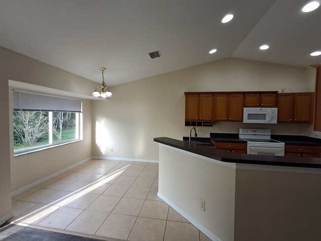 135 Greenbriar Blvd, Lehigh Acres, FL 33972 - photo 3