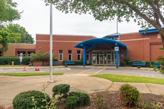 Children work and study at David Cox Road Elementary school in West Sugar Creek.