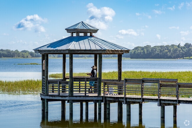 Relax and spend a day fishing on the pier at Lake Hernando in Hernando.
