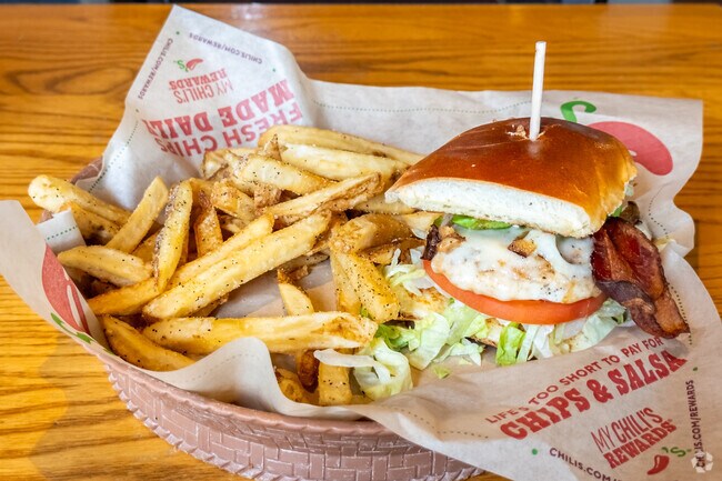 Enjoy a chicken sandwich at a restaurant in Cloverleaf near Crossroads Mall.