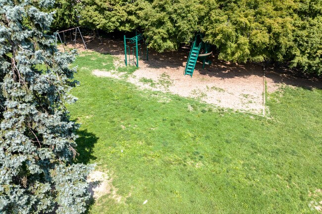 Open spaces with shady trees are a hallmark of Charles Kelly Elementary School.