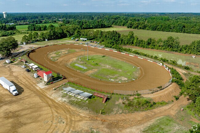 The dirt track is a challenge for drivers speeding along at Rockfish Speedway.
