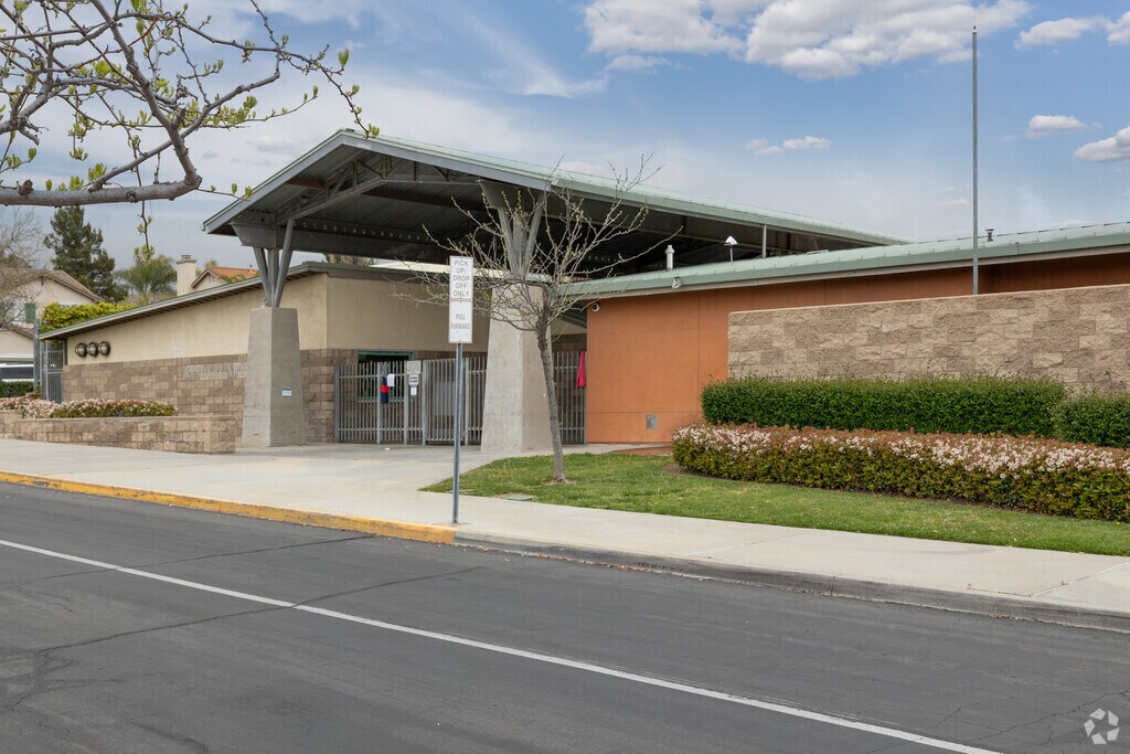 Green Grass and Flowers in Bloom at John F. Kennedy Elementary School.