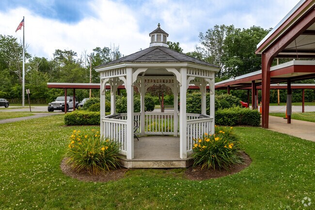 A well manicured gazebo sits in front of Spring Street Elementary School in West Bridgewater.