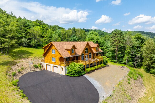 Some Lower Towamensing homes are mountain chalets with breathtaking views.