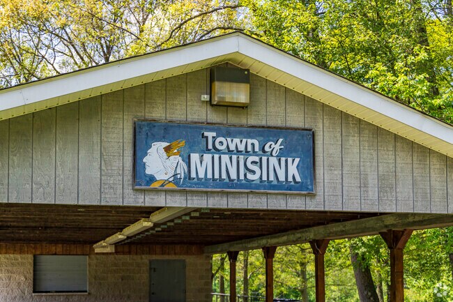 As you arrive at the Minisink neighborhood, a friendly town sign extends a warm welcome.