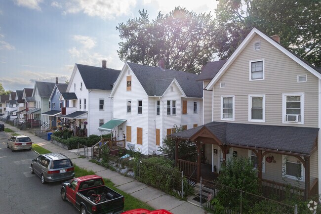 A row of homes displays the various architecture within Memorial Square.