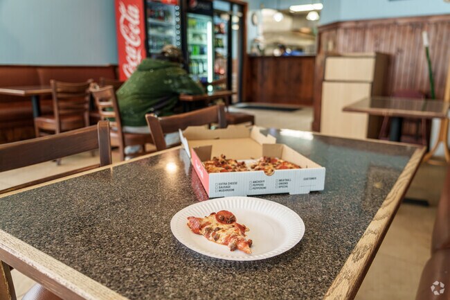 Best Quality Pizza makes everything to go but will give you paper plates if you decide to stay.