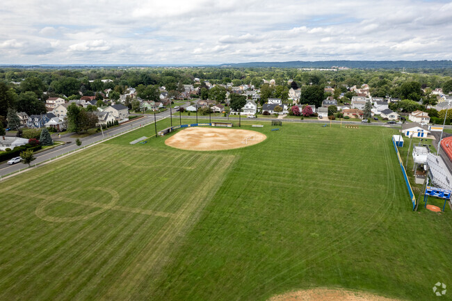 Play baseball at Manville High School.