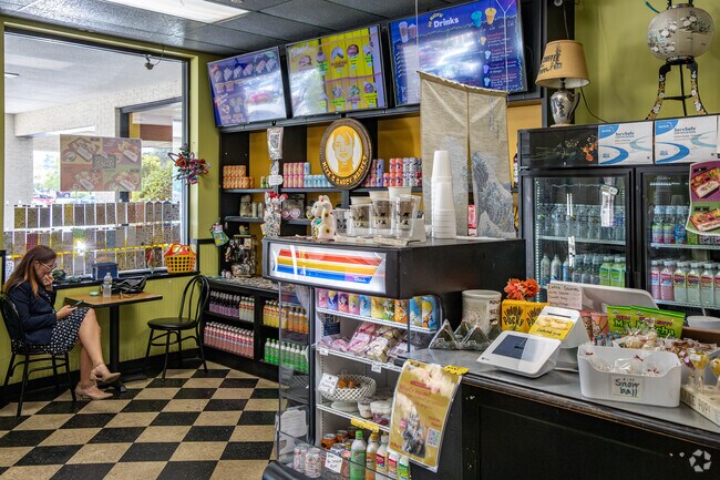 Toshi's Cafe features a unique interior blending a market concept with counter service.