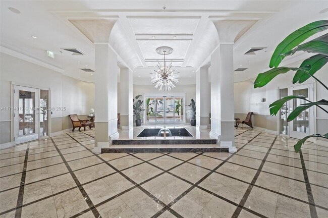 Courvoisier Courts unit 609, Miami, FL 33131 - photo 3