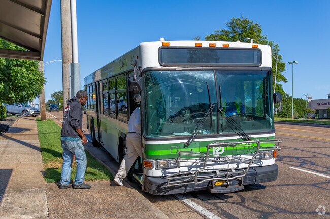 In Poplar Pines, there are numerous bus stops along Poplar Avenue.
