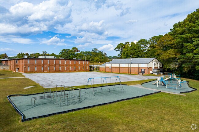William M. Mcgarrah Elementary School features a playground and green space for the students.