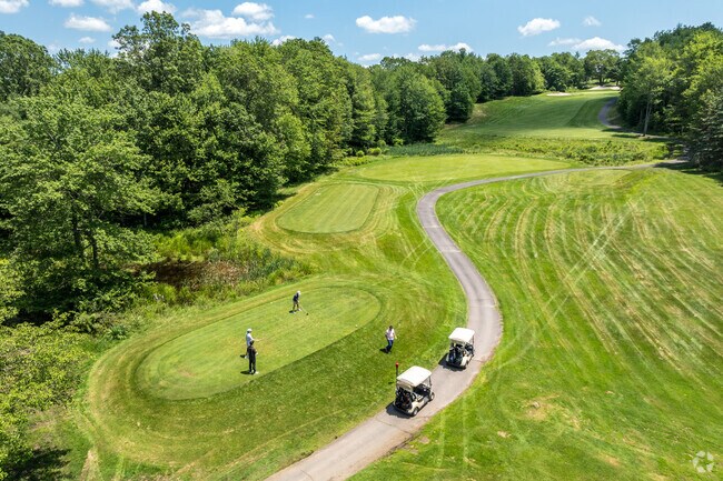 A group of golfers get ready to tee off at Split Rock Golf Club in Kidder.