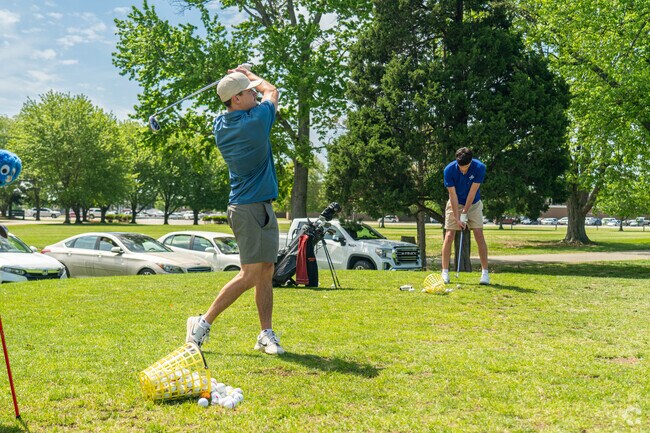 Golfers play a round at the Rea Park Golf Course in Terre Haute, IN.