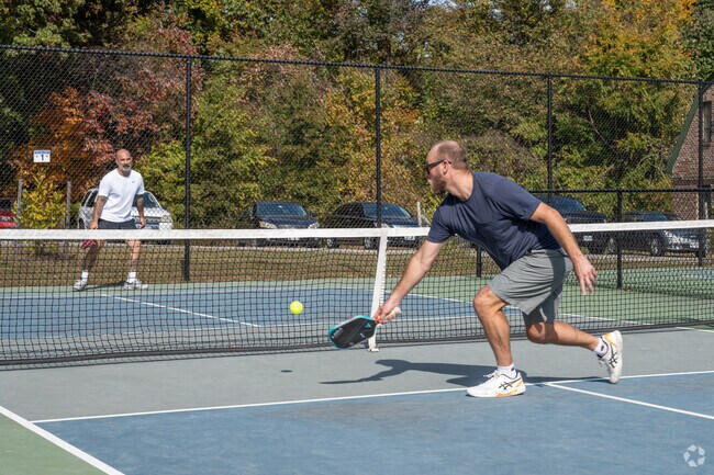 Locals of Swanson enjoy a game of Pickleball at Forest Hill Park.
