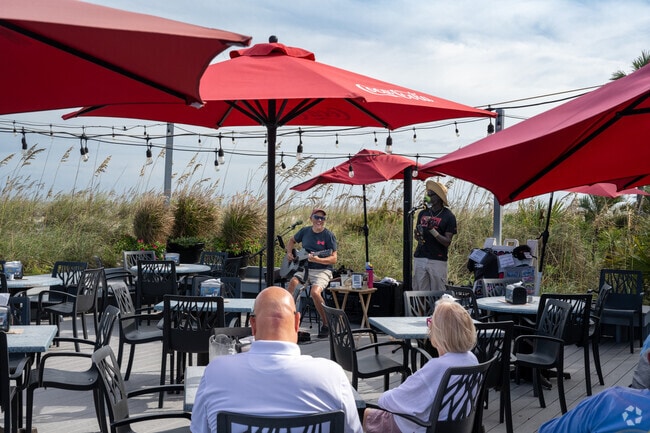 You can enjoy live music while dining at The Dunes House in Palmetto Dunes.
