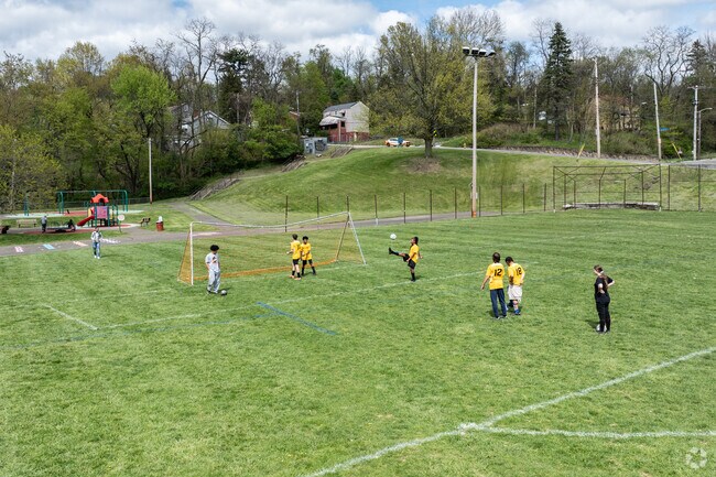 Kids get together to play soccer at Phillip Murray Park.