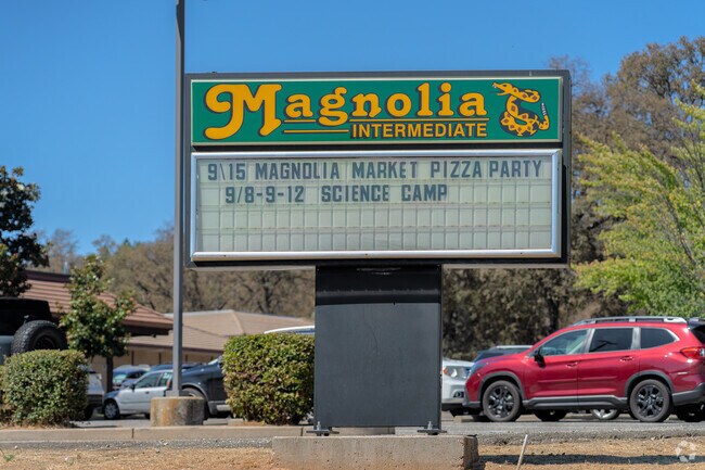 Important information is posted on the Magnolia School signage.