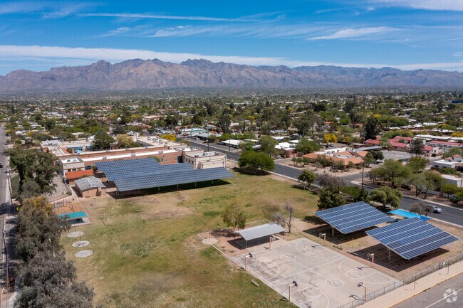 Solar panels are added to the Blenman Elementary School to make the campus greener.