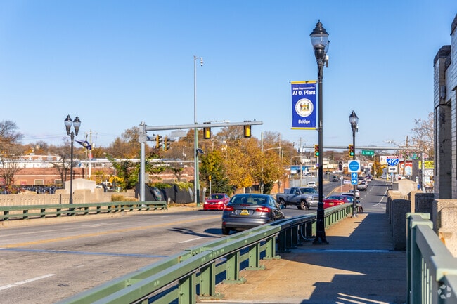 The 11th Street Bridge spans Brandywine Creek into a close-knit rowhome district.