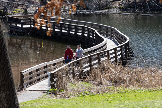 Manchester's Center Springs Park features a boardwalk into the center of the pond.