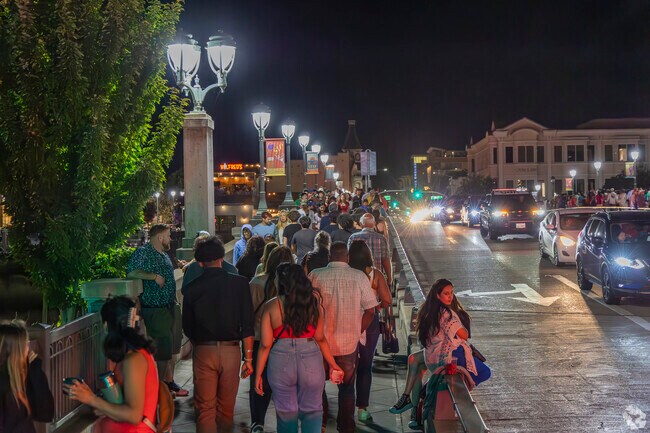 The third street bridge fills with people during the Fourth of July Drone Show in McPherson.