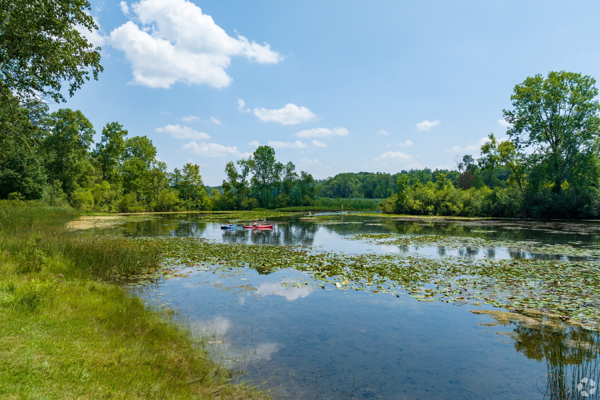 Proud Lake Recreation Area's Powers Beach is a 15-minute drive from Highland Charter.