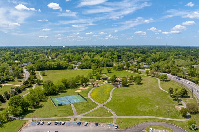 Vaughn Road Park spans southeast of Hillwood with trails and courts.