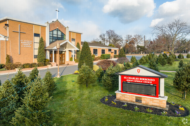 A tranquil courtyard at St. Charles Borromeo, where moments of peace and reflection are found.