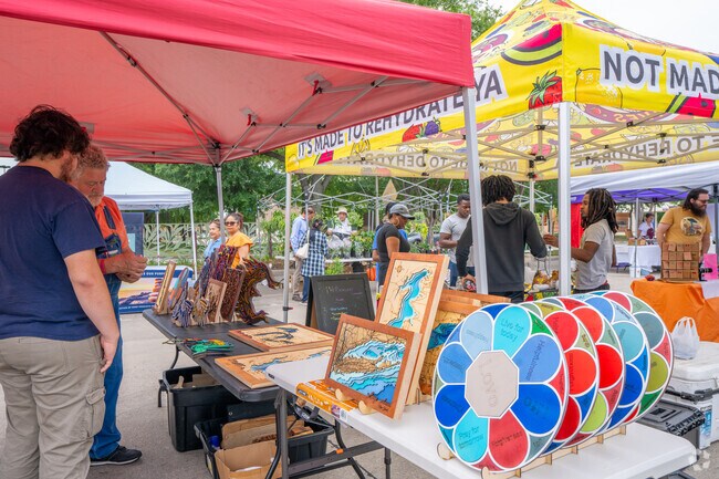 Plano residents visit Willow Bend Farmers Market for organic and handmade items.